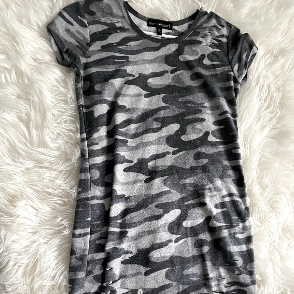 A dress that has little cuts in it camouflage